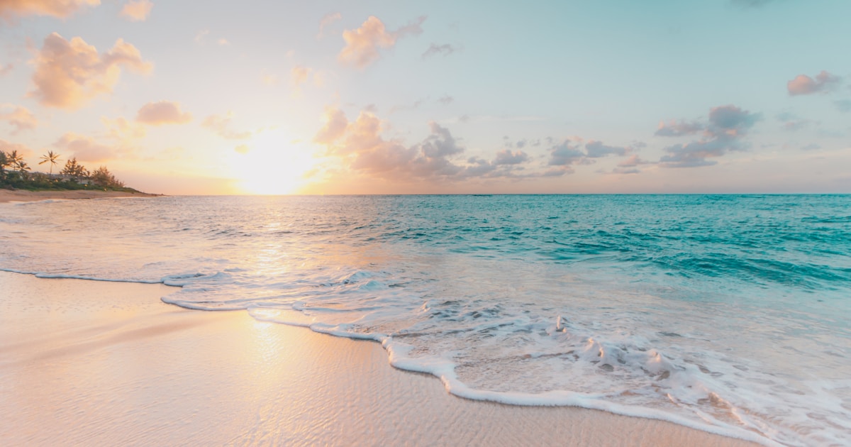 Abstract watercolor of a calm shoreline where water meets sand in a clear, soft line — a visual metaphor for a healthy boundary